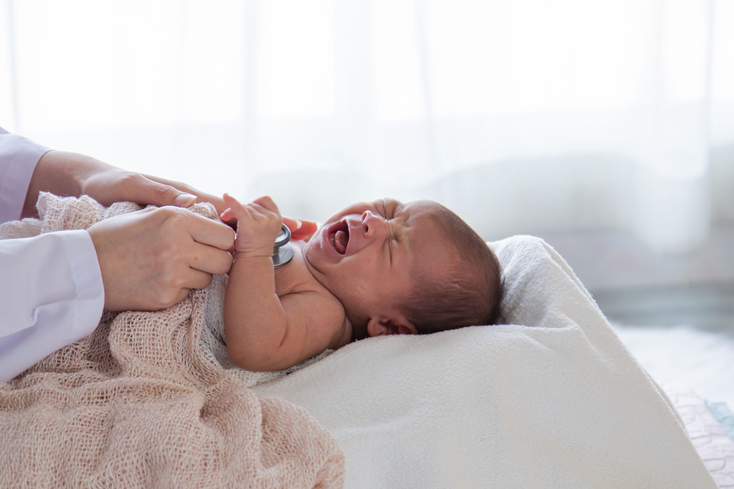 Asian,Newborn,Baby,Get,Sick,Crying,During,Examine,By,Pediatrician